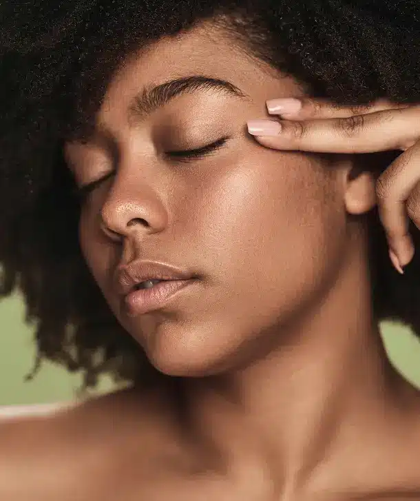 closeup of face of a african american woman with rejuvenated skin