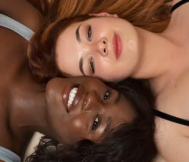 two women with clear tight skin