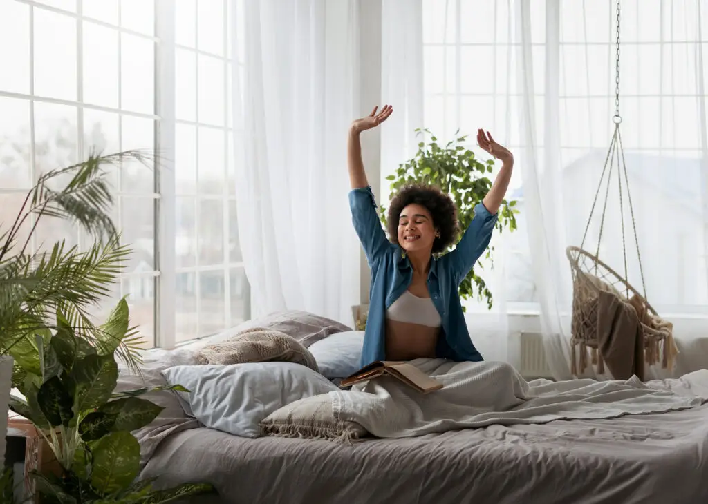 happy relaxed woman on bed